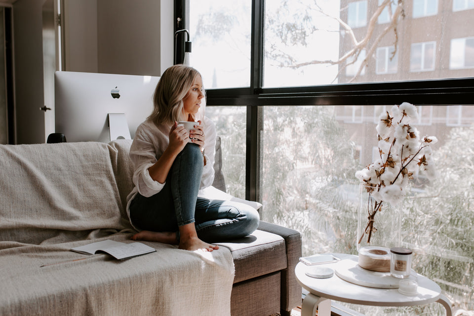 Image of woman looking out her window. xOne Session a Week First, we suggest that you work with one audio session  and one homework session per week.